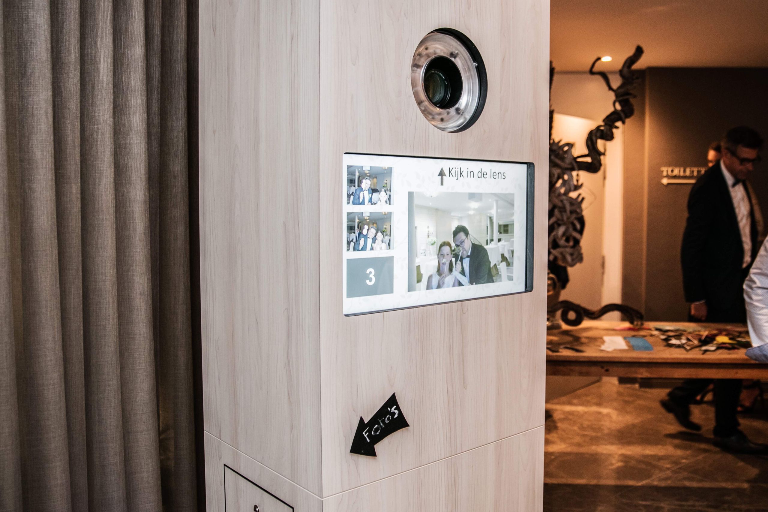 Touchscreen of the photo booth showing the latest photos